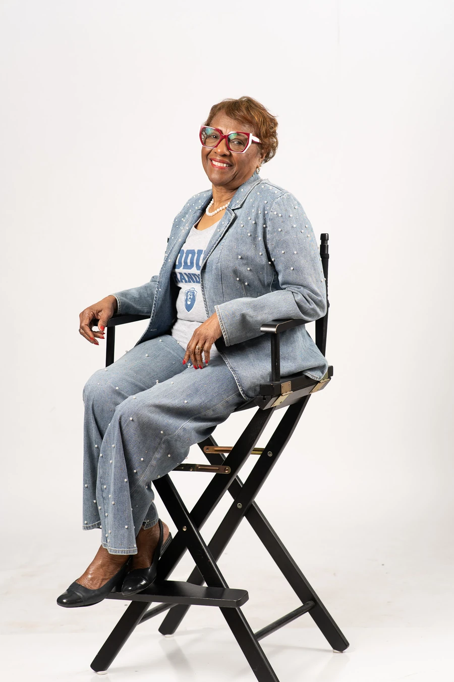 Sharon Bonner Yates, founder of PEARLS, seated and smiling
